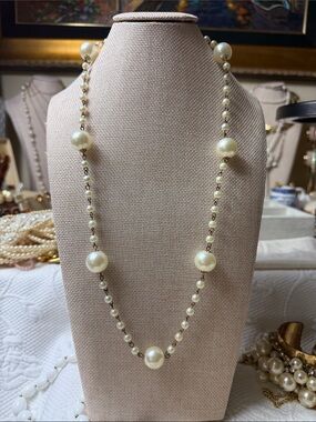 The Classic Ivory Pearl Station Necklace is an elegant piece of women’s jewelry.